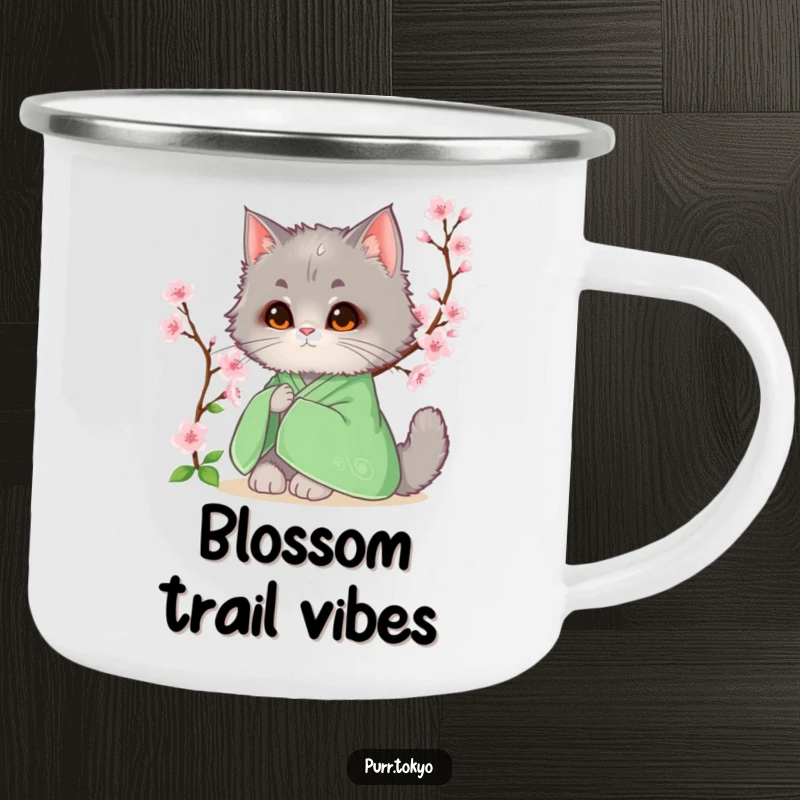 Funny camping mug of a fluffy grey cat in a green kimono sitting beside a blooming cherry blossom, perfect for nature lovers.
