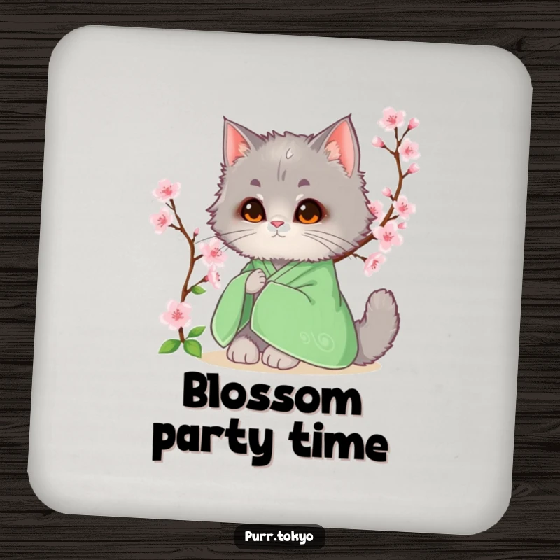 Funny coaster featuring a fluffy grey cat in a green kimono sitting beside a blooming cherry blossom, adding floral elegance.